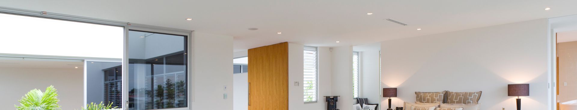 Living room with Mitsubishi Electric ducted heat pump vents