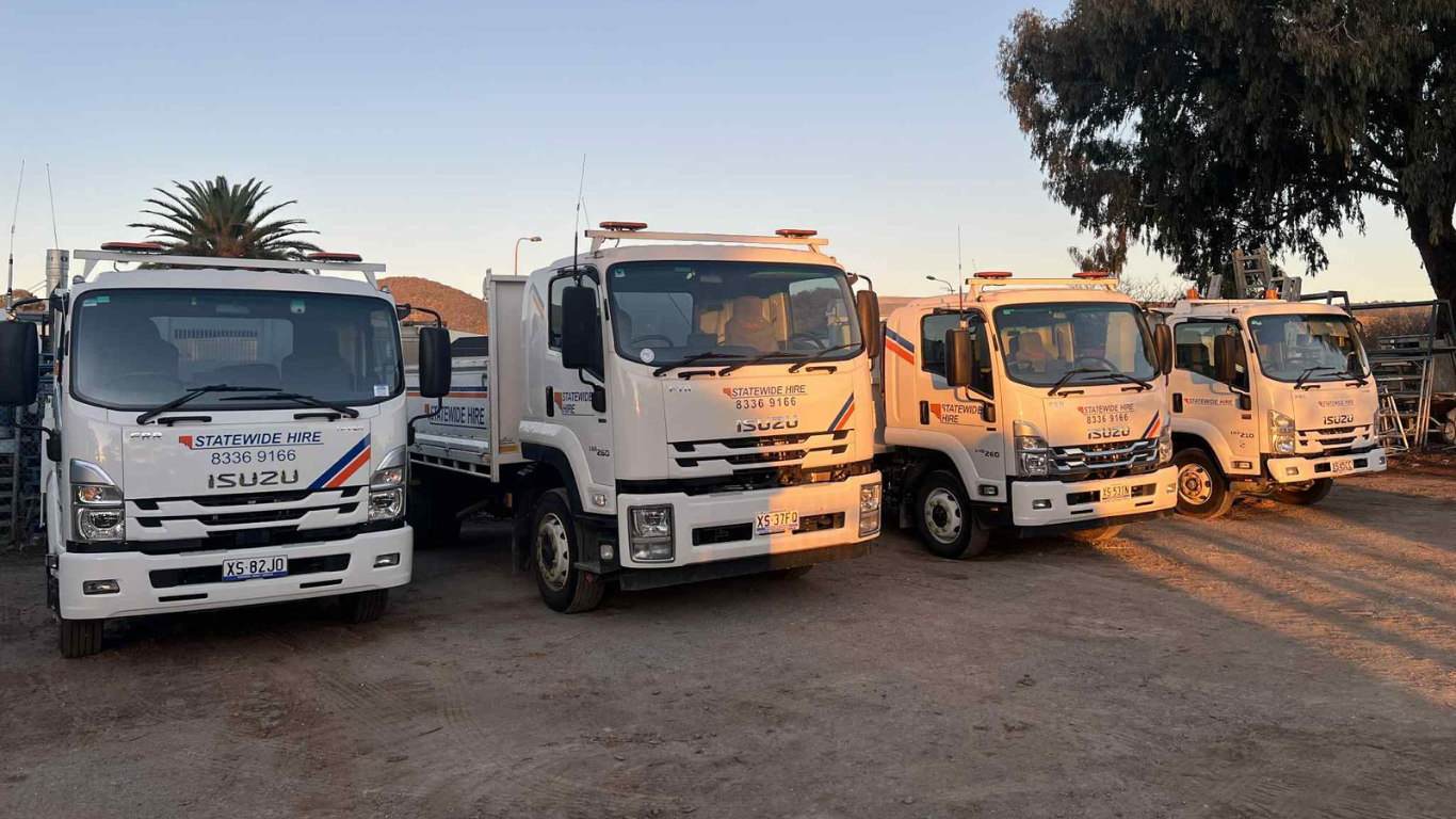 Tipper truck unloading gravel at construction site in Adelaide