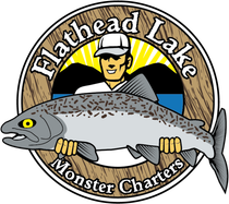 Flathead Lake Monster Charters logo: man holding large fish, lake, mountains, sun, wooden frame.