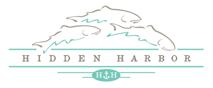 Hidden Harbor, Woods Bay 33336 Whitecap Lane Bigfork, MT 59911 The logo for hidden harbor is a drawing of a mountain and a tree.