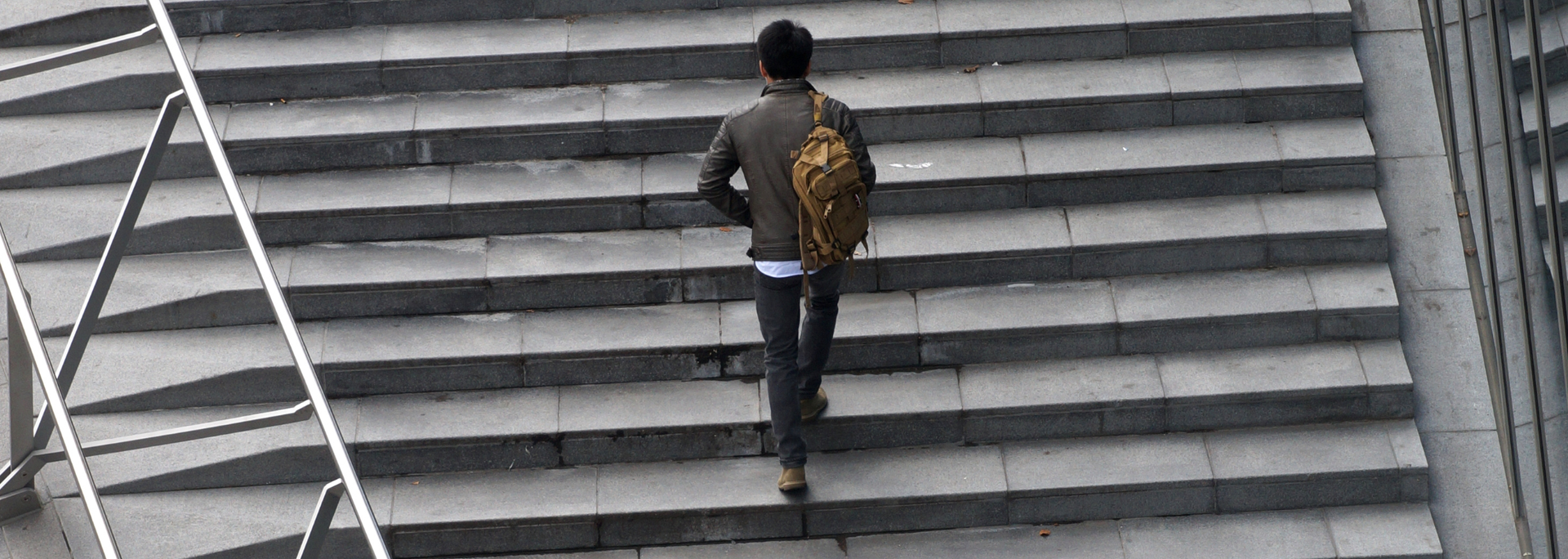 Picture of a Person climbing stairs. Picture of a Person climbing stairs.