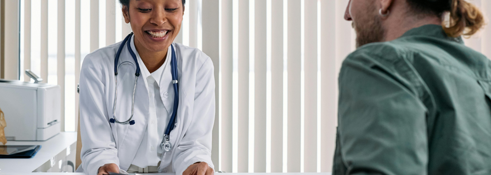 Picture of a person in consultation with a doctor. Picture of a person in consultation with a doctor.