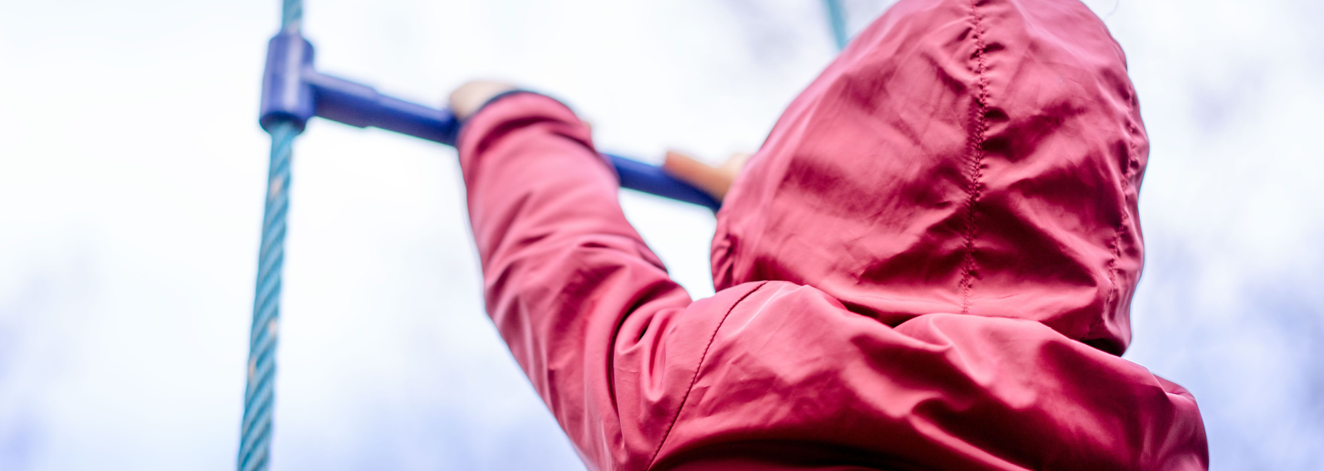Picture of a child, with their back turned.
