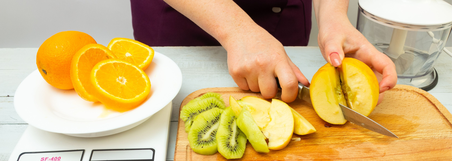 Picture of someone chopping fruit. 