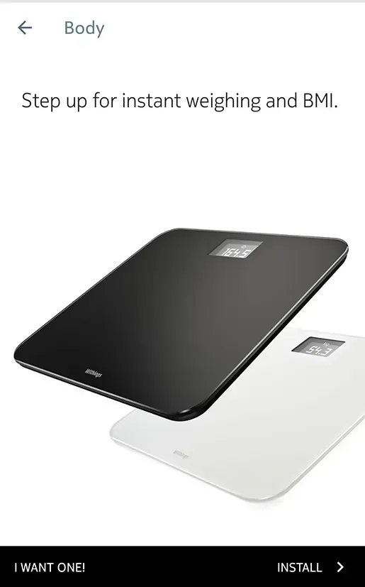 A black and white scale with the words `` step up for instant weighing and bmi '' on it.