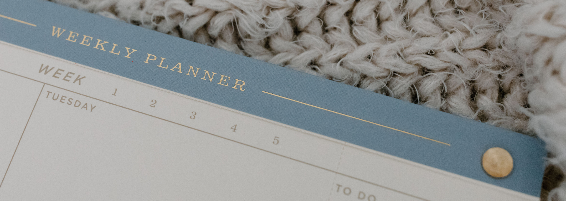 Picture of a weekly planner. 