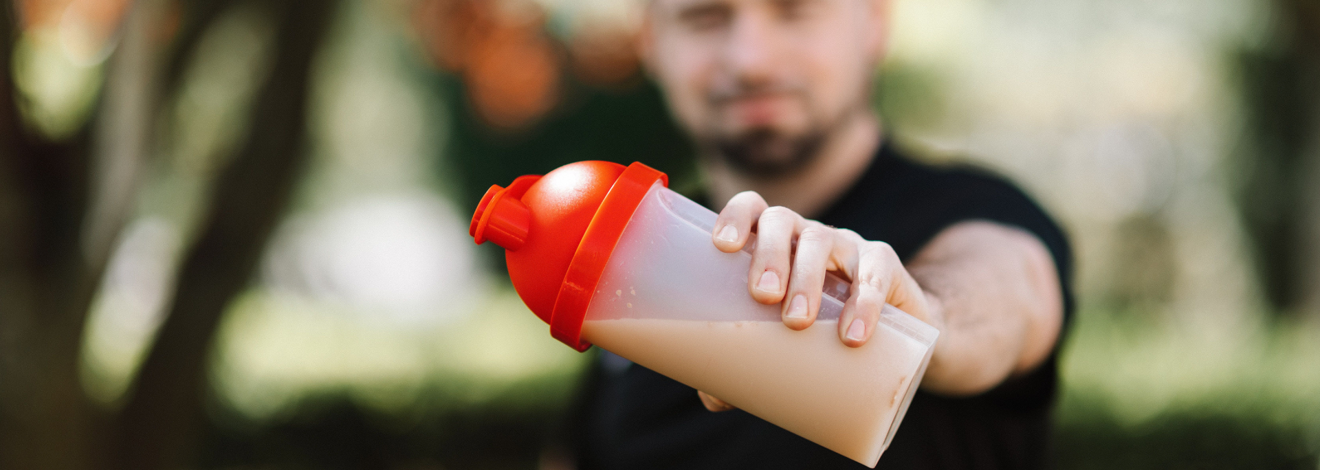 Picture of a man holding a shake. 