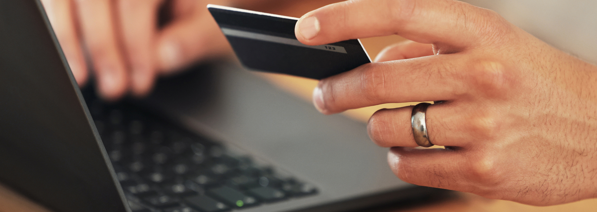 Picture of someone making an online purchase. 