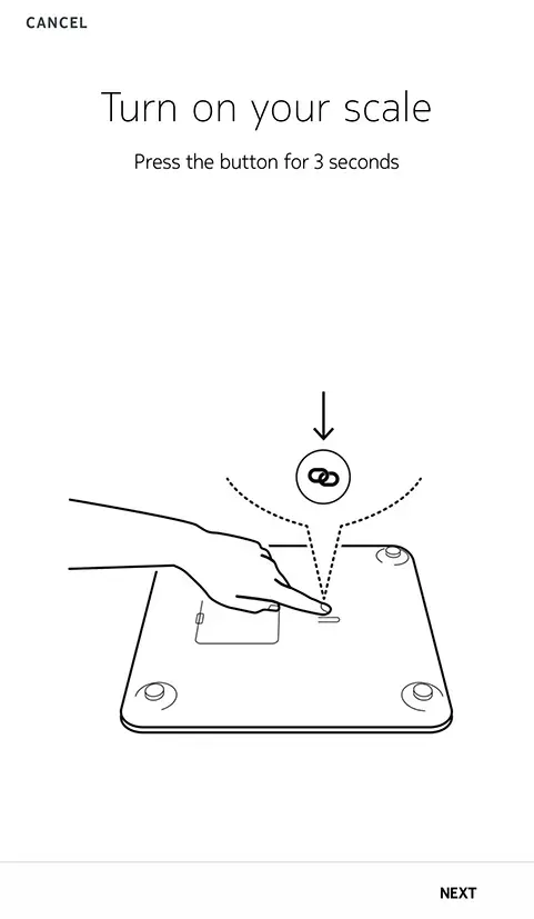 A person is pressing a button on a scale.