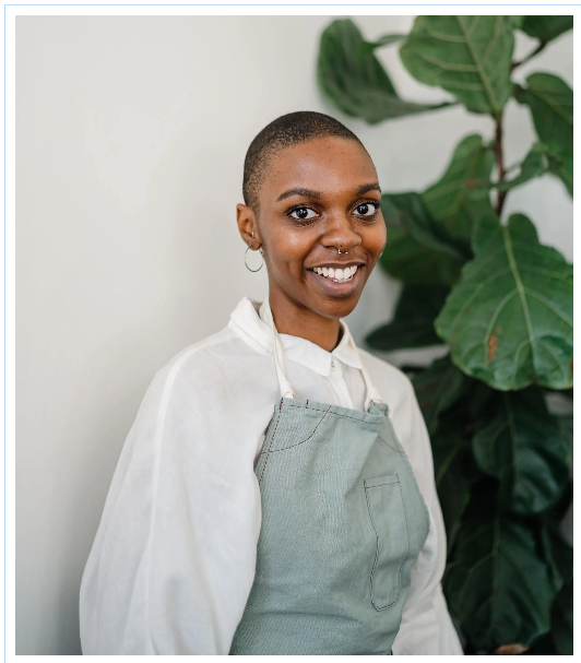 Stacy Adams smiling in the shop