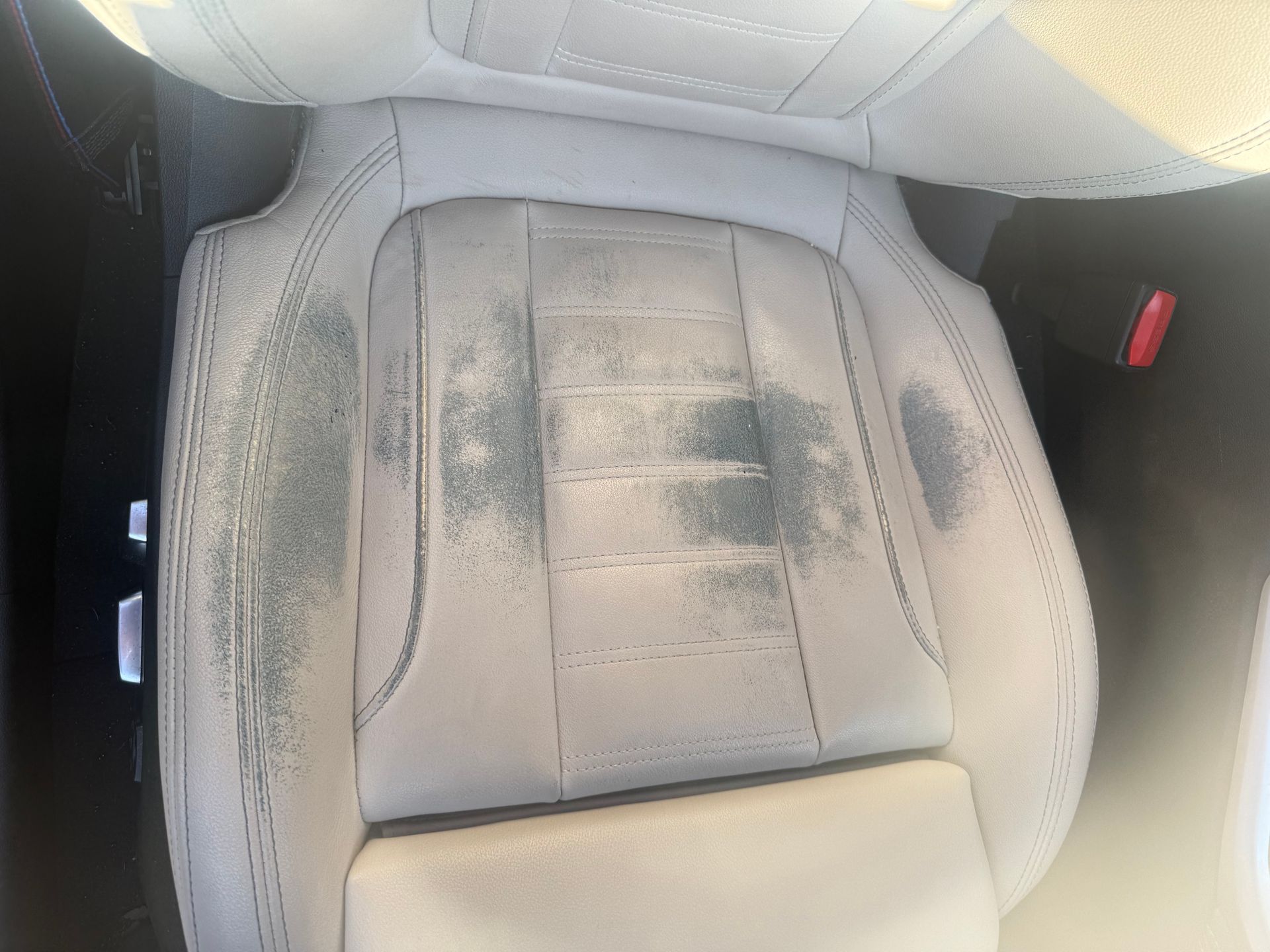 Denim dye transfer  friction wear Bmw car leather seats 