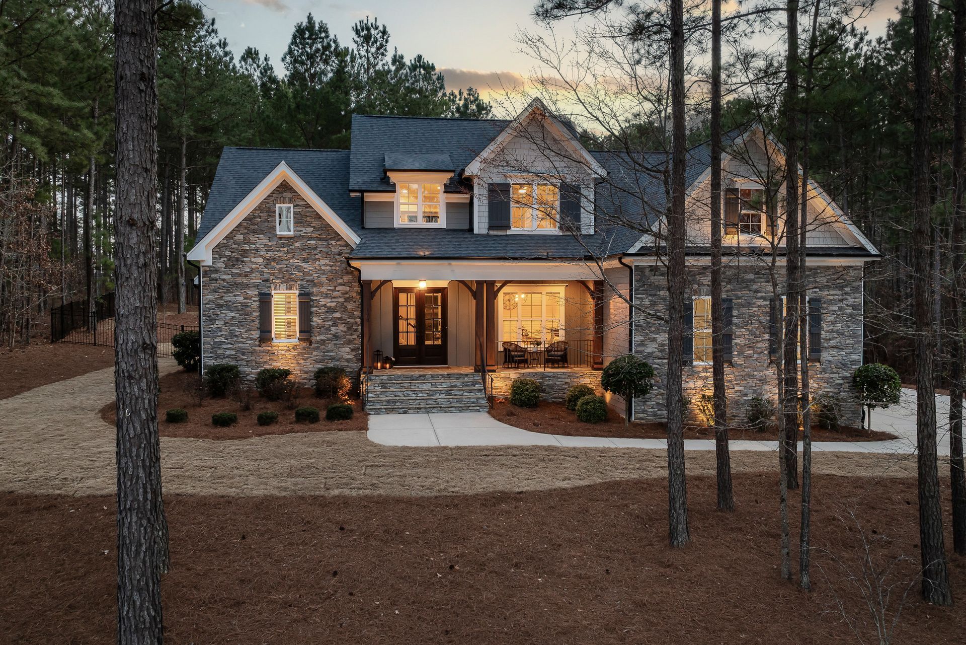 Custom home built by Sweeney Build in New Orleans, elevated above base flood elevation