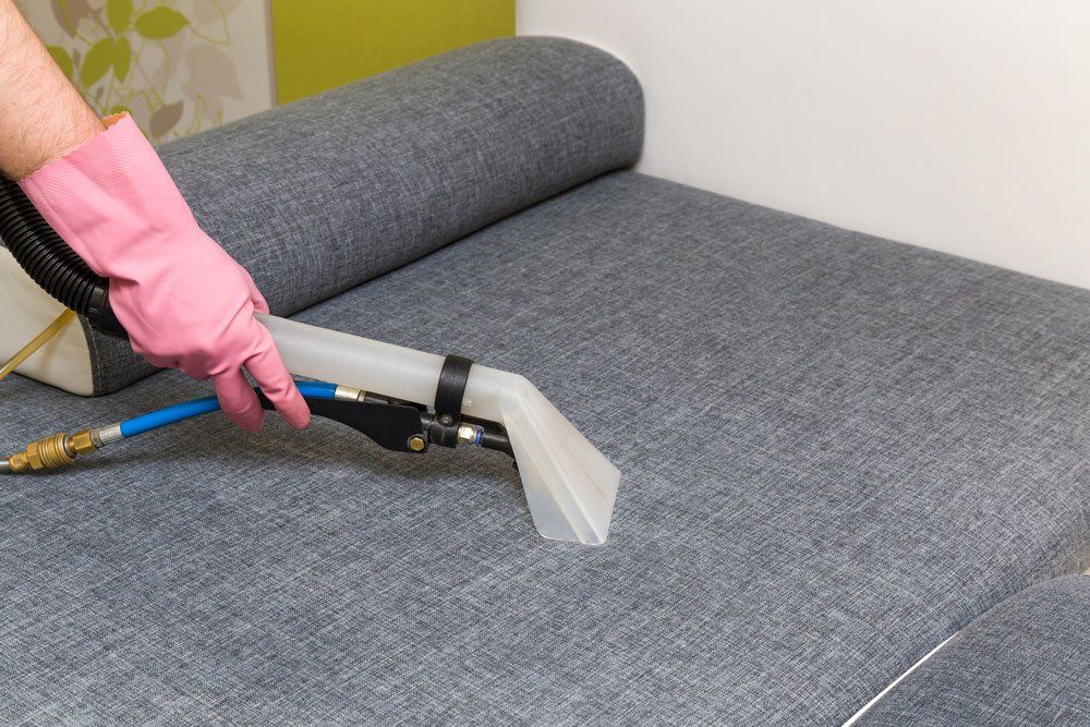 a Person Wearing Pink Gloves — Enviro Clean Carpet and Tile Cleaning in Wyong, NSW
