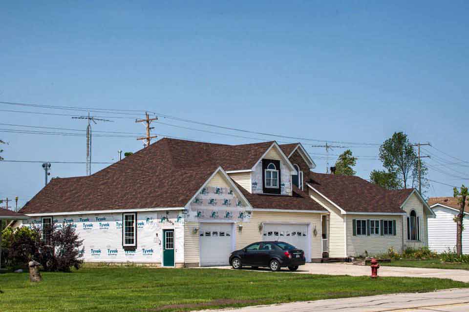 House Exterior With A Car — Morris, IL — Shenberg Construction