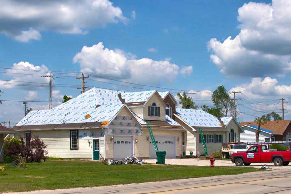 Roof Covered With White Roofing Materials — Morris, IL — Shenberg Construction