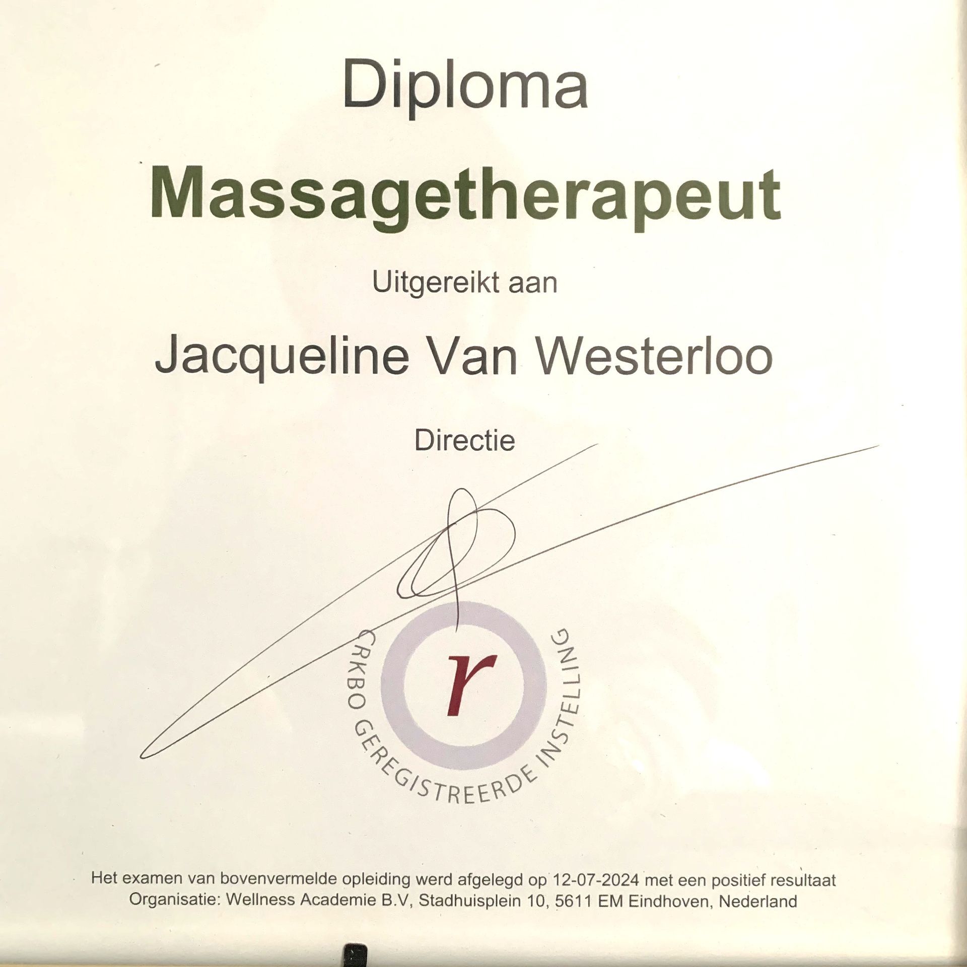 Diploma voor massagetherapeut, uitgereikt aan Jacqueline Van Westerloo, met handtekening en zegel.