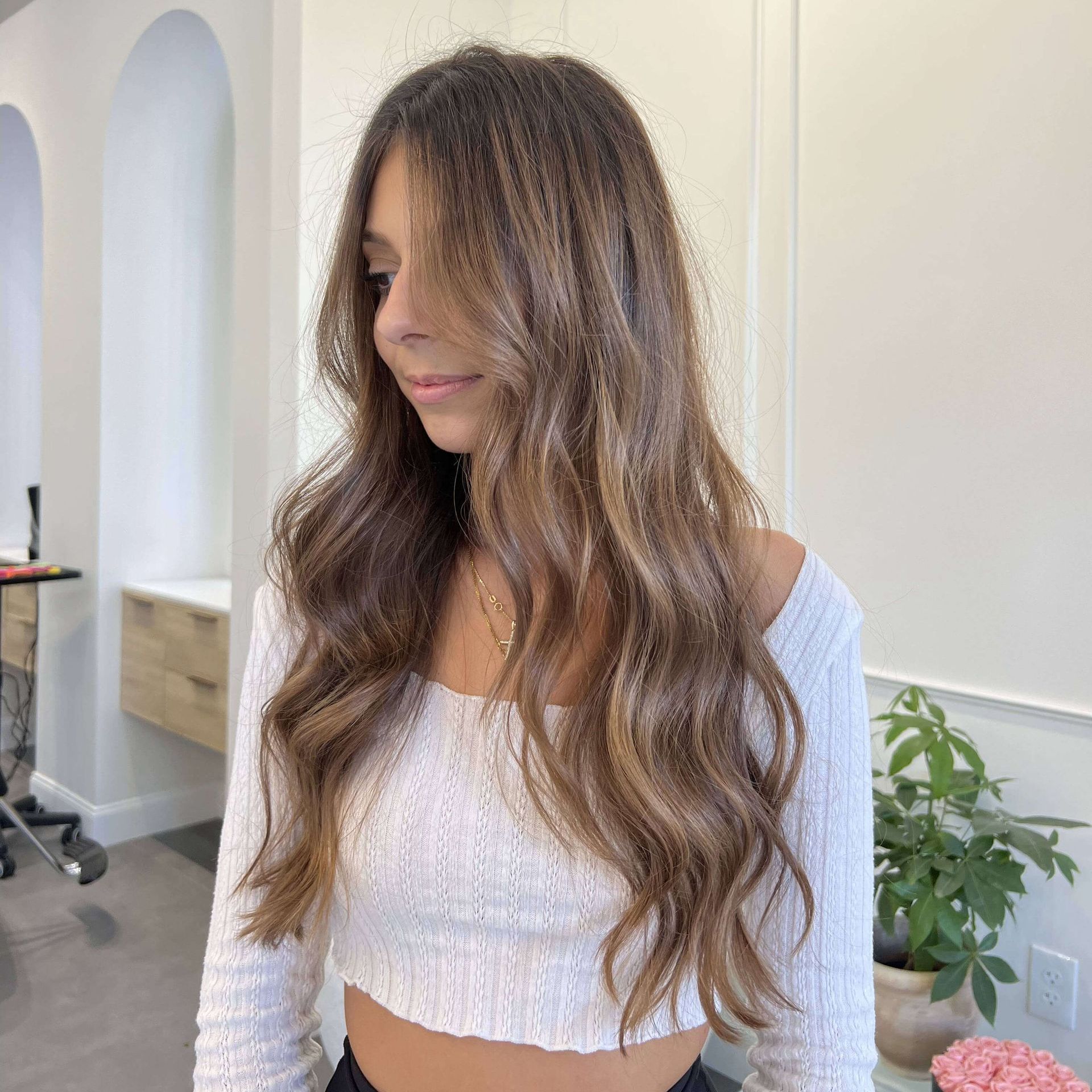 Woman with recently cut, wavy hair