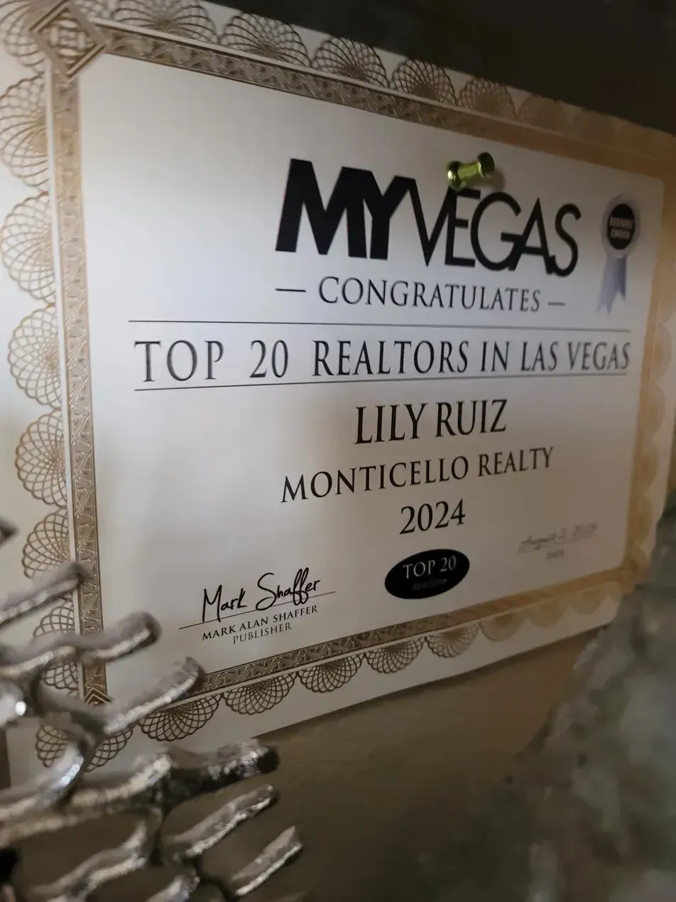 MyVegas “Top 20 Realtors in Las Vegas” award plaque for Lily Ruiz, 2024, on a decorative wall