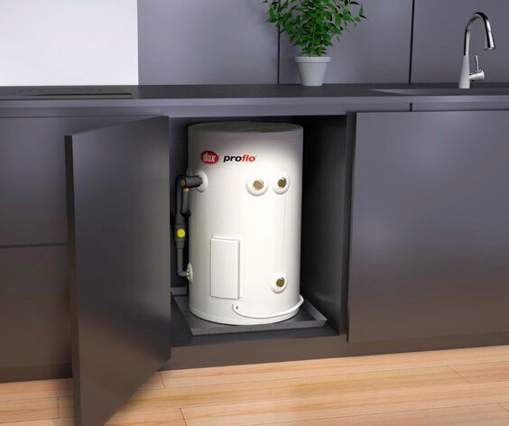 White Water Heater Under a Kitchen Counter in a Modern Grey Cabinet — Taree Hot Water in Taree, NSW