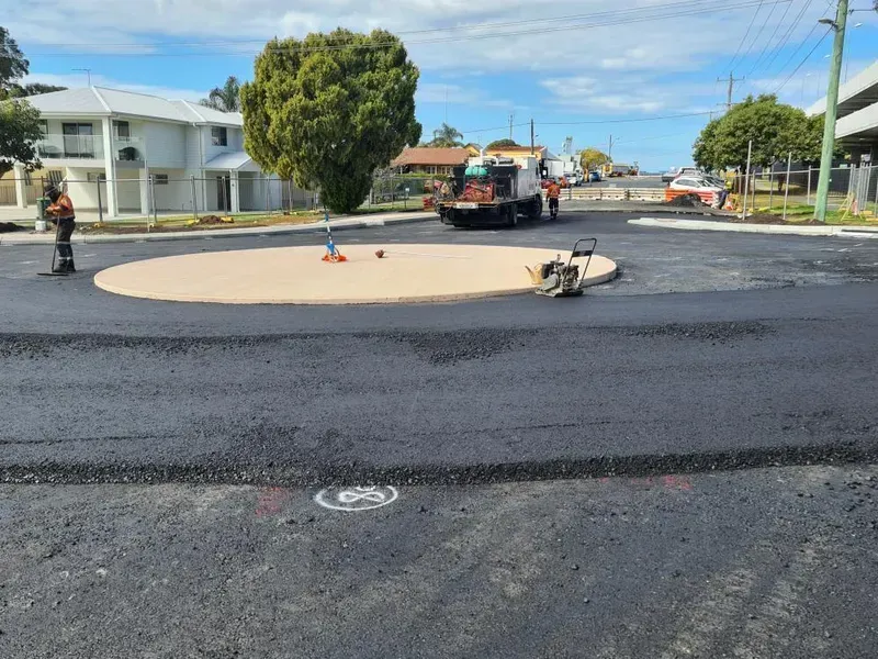 Road Construction: Asphalt Being Laid on a Roundabout — Jim Anderson Earthmoving Pty Ltd In Laurieton, NSW
