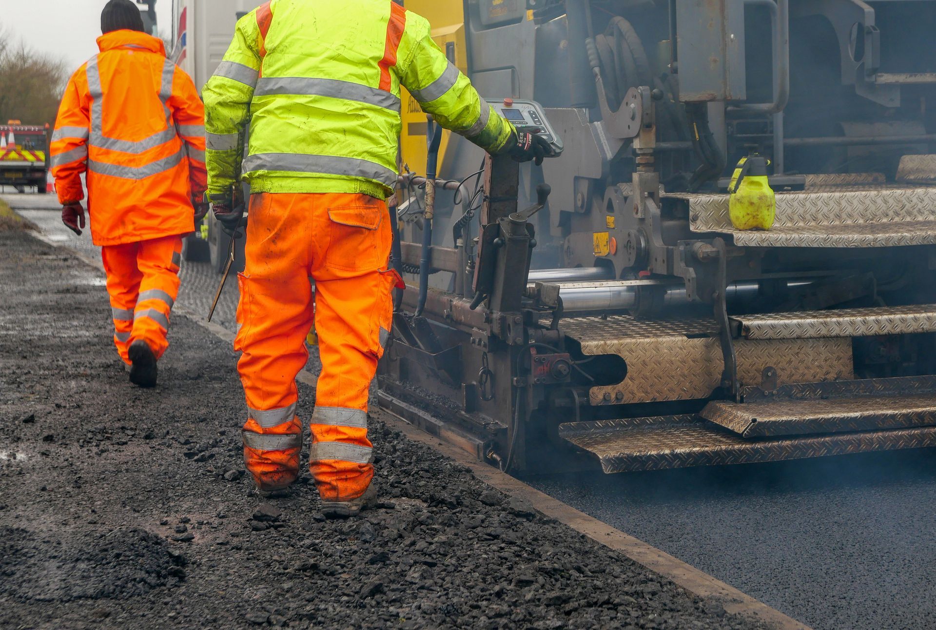 Construction Workers Laying New Asphalt — Bear, DE — S. Hicks Paving LLC