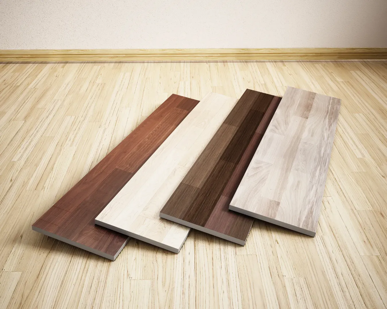 Four wood-look flooring planks in brown and beige arranged on a light wood floor.