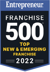 Entrepreneur Franchise 500 Top New & Emerging Franchise 2022 badge in blue, black, gold, and white