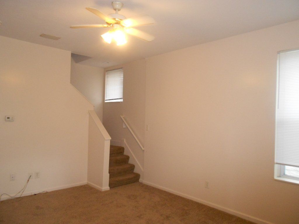 39-E-Patterson- Living room with Stair case