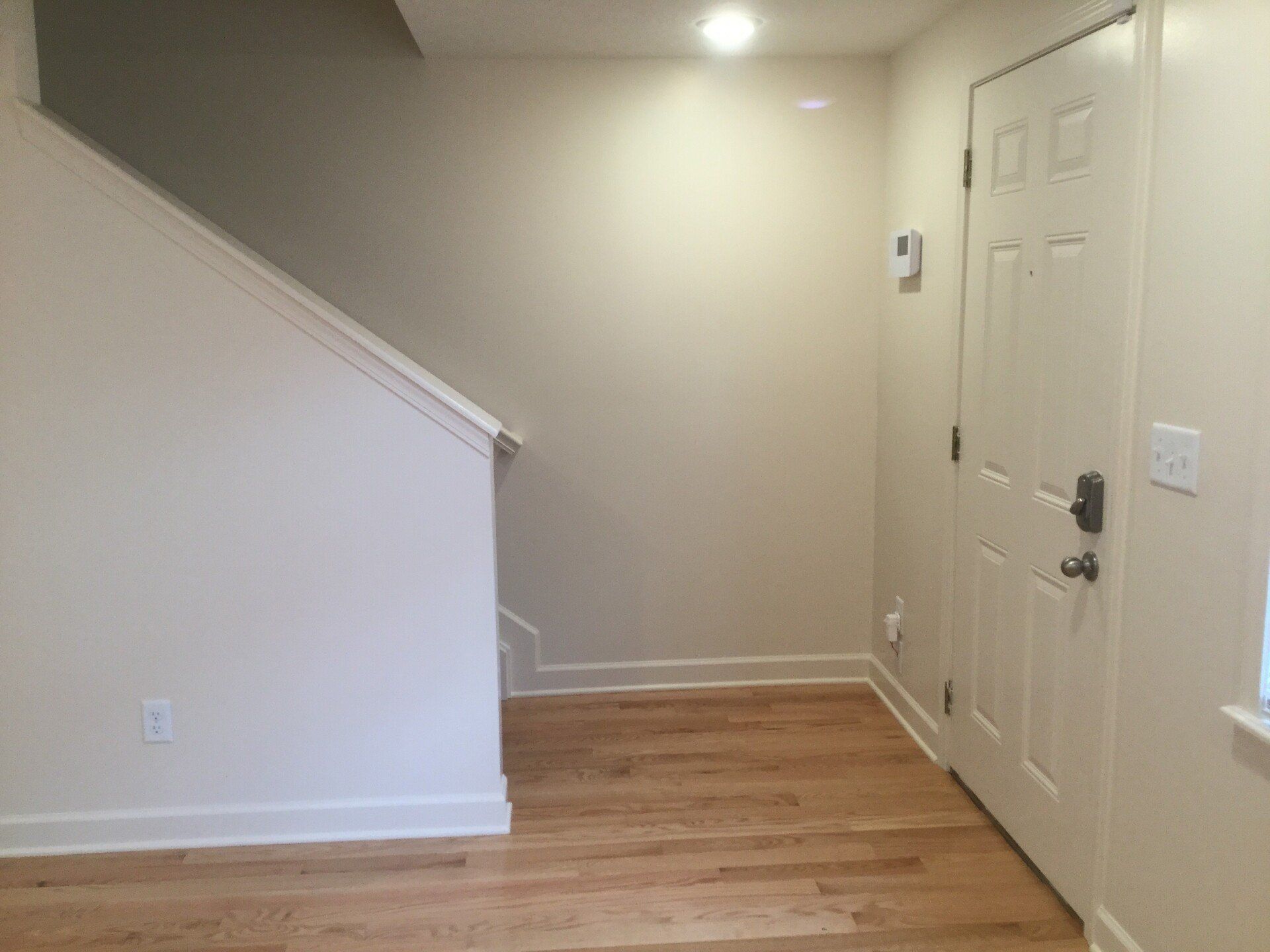 90 W. 9th Ave. Apt. 1 - Living room Staircase