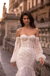 Model wearing an Eva Lendel
wedding dress