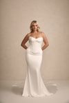 Model wearing an MWL wedding dress