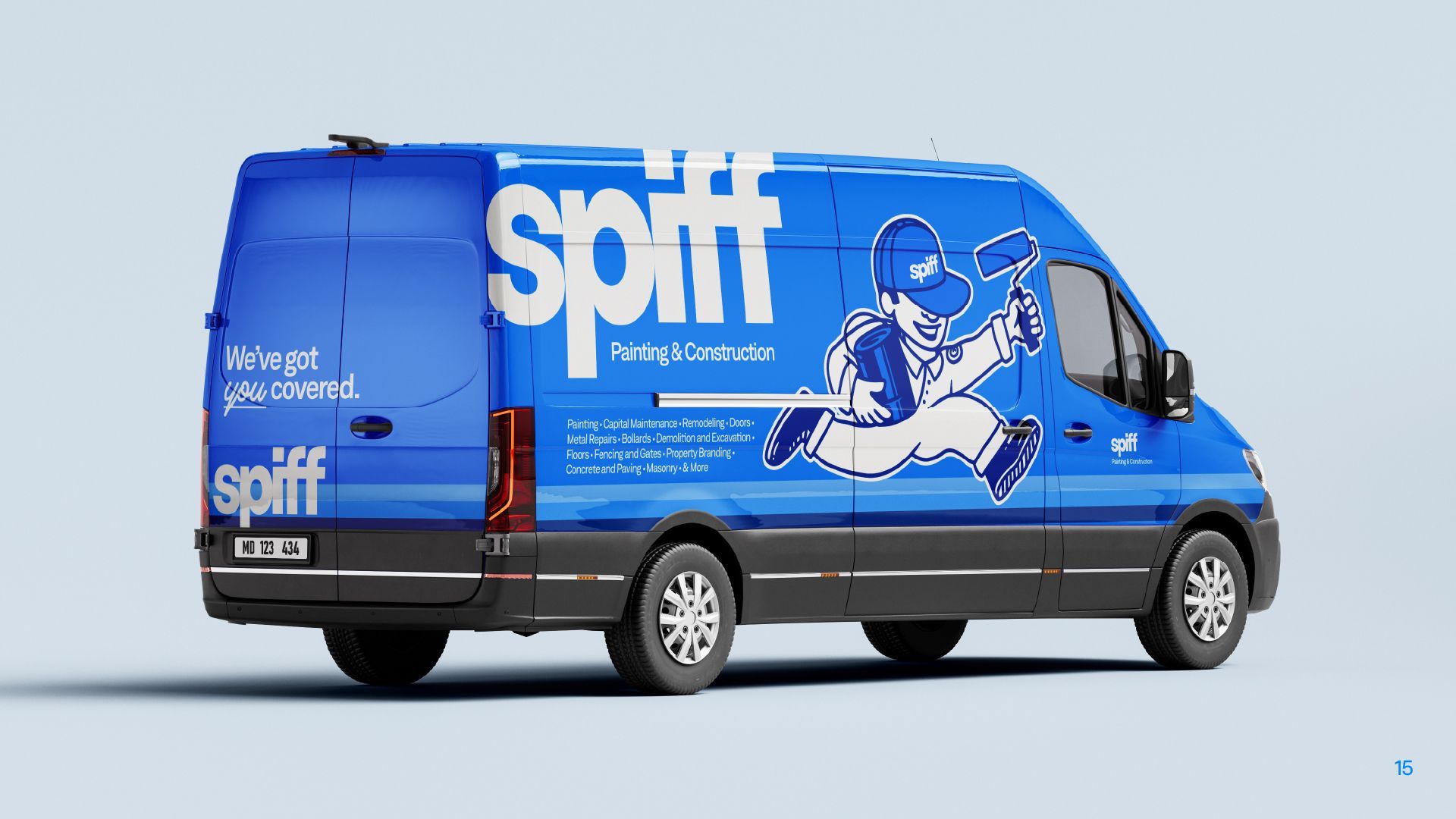 Blue Spiff delivery van with large white logo and cartoon illustration on the side.