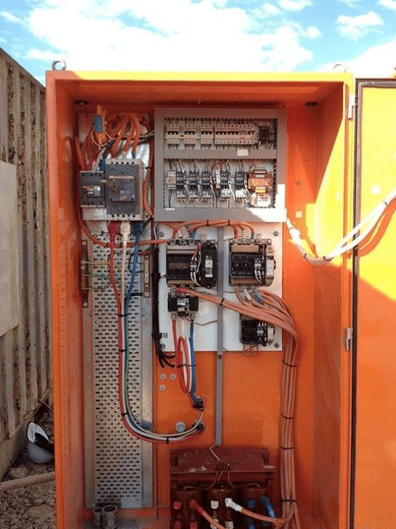 A Large Orange Electrical Box With a Lot of Wires Coming Out of It — Himec Electrical In Gatton, QLD