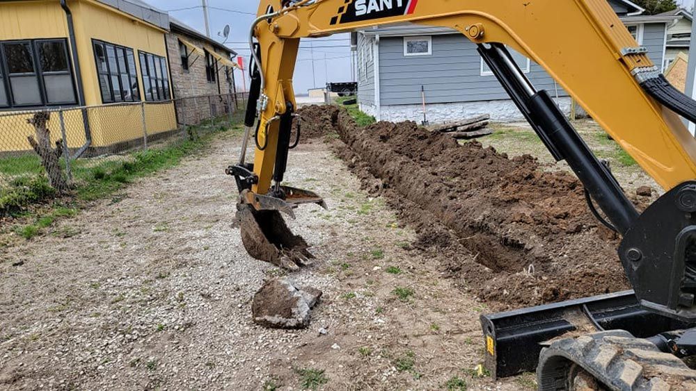 Excavator Digging For French Drains In Kansas City, MO