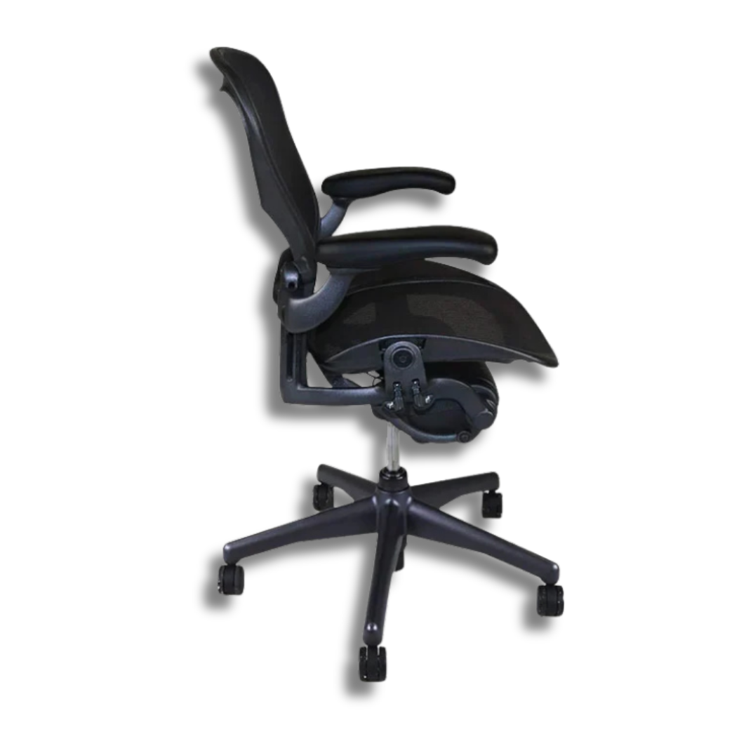 Used Herman Miller Aeron Black ergonomic office chair, side view. Mesh back and seat, armrests, five-star base with wheels.