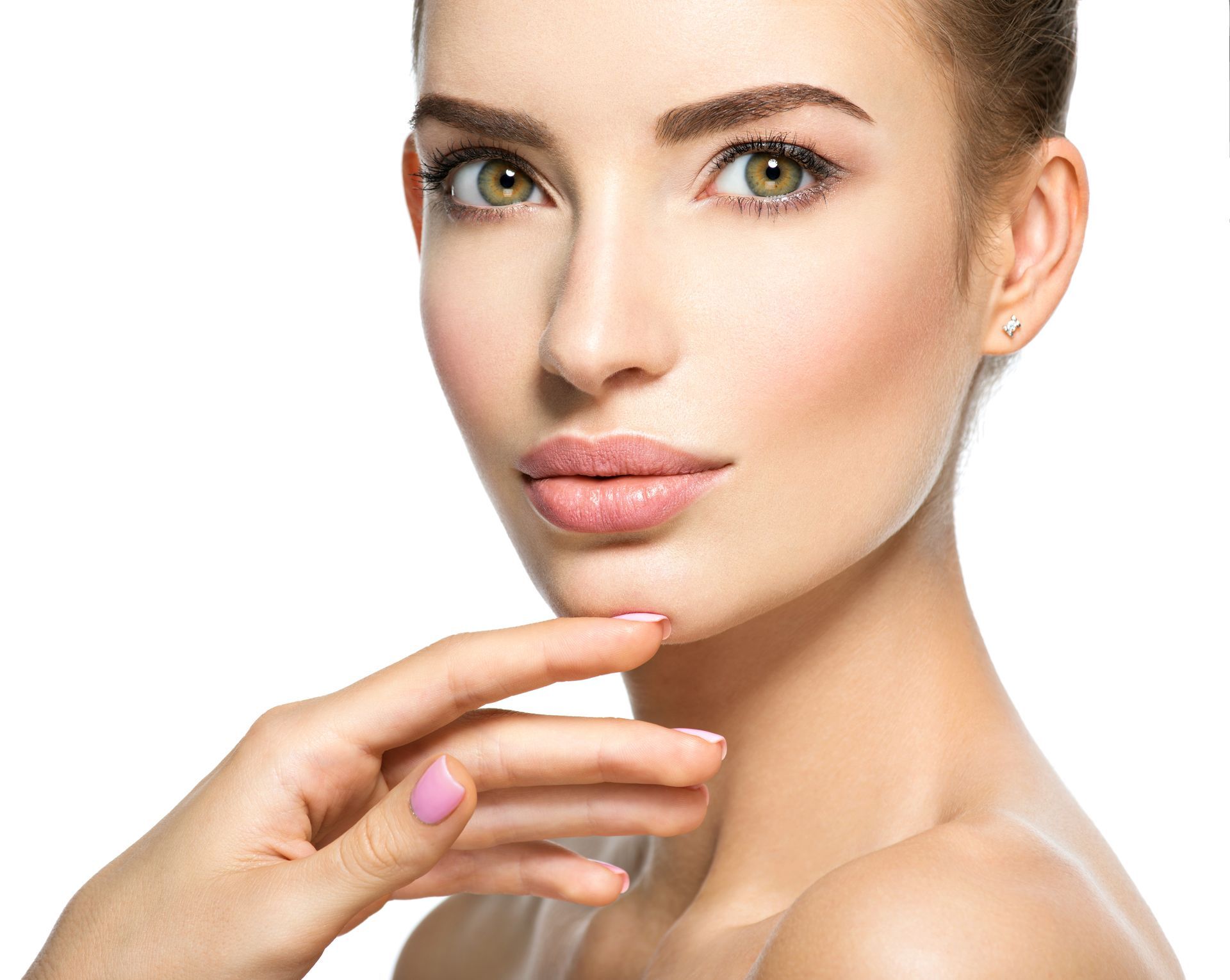 A close up of a woman 's face with her hand on her chin.