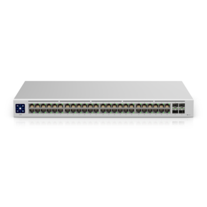 A white switch with a lot of ports on it on a white background.