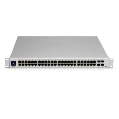 A white switch with a lot of ports on it on a white background.