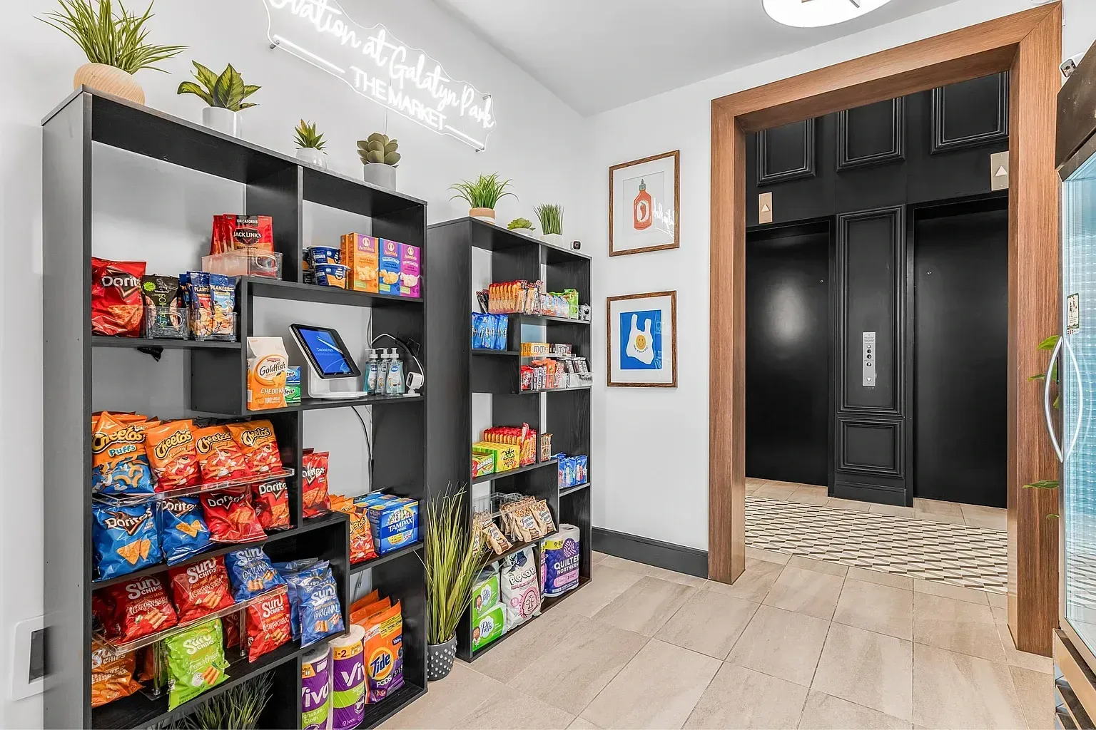 Marketplace with snacks and pantry items and elevators in the background.