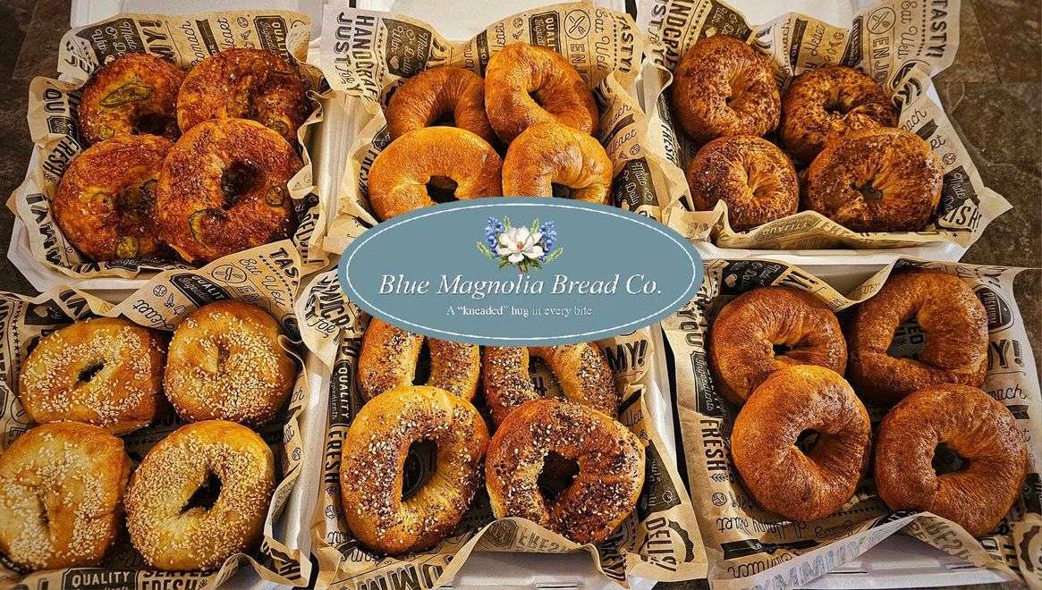 A variety of bagels are sitting on a table