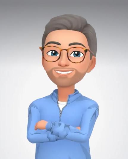 A cartoon man with glasses and a beard is standing with his arms crossed.