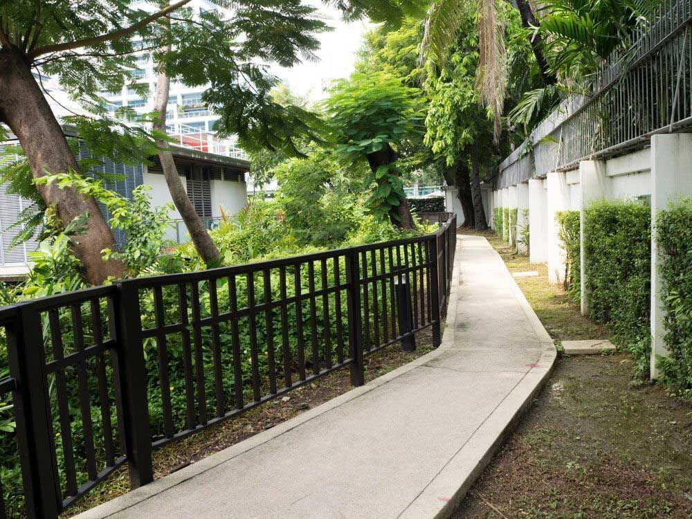 A Walkway With a Fence Along the Side of It — Hastings Valley Powdercoaters in Taree, NSW