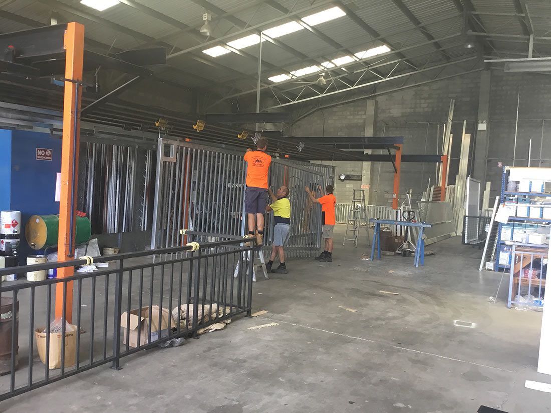 A Group of People Are Working in a Large Warehouse — Hastings Valley Powdercoaters in Macksville, NSW