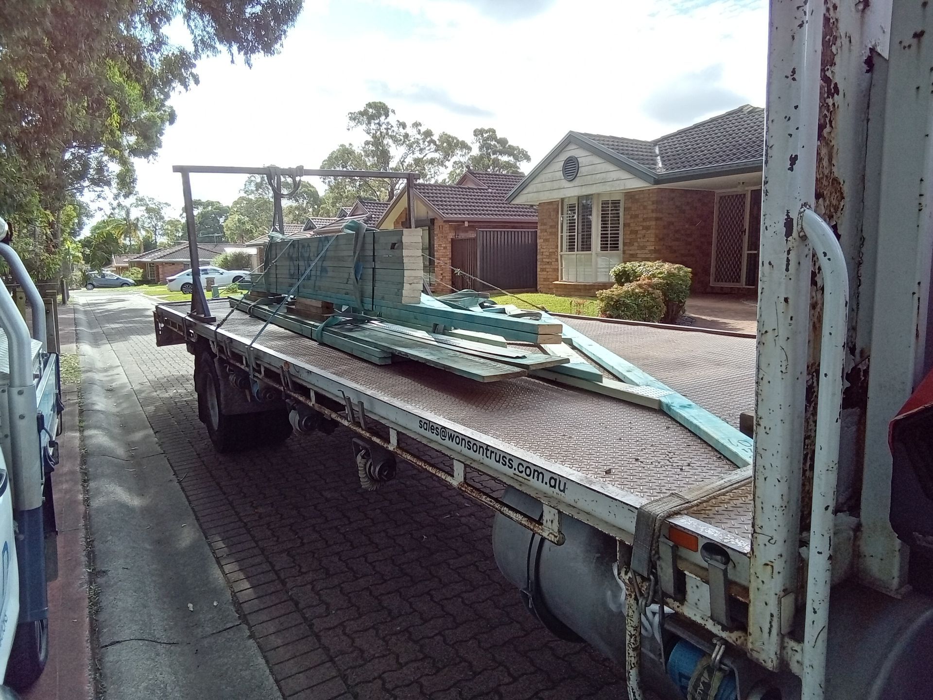Prefabricated timber roof trusses delivered to a residential building project in Menai, Sydney.