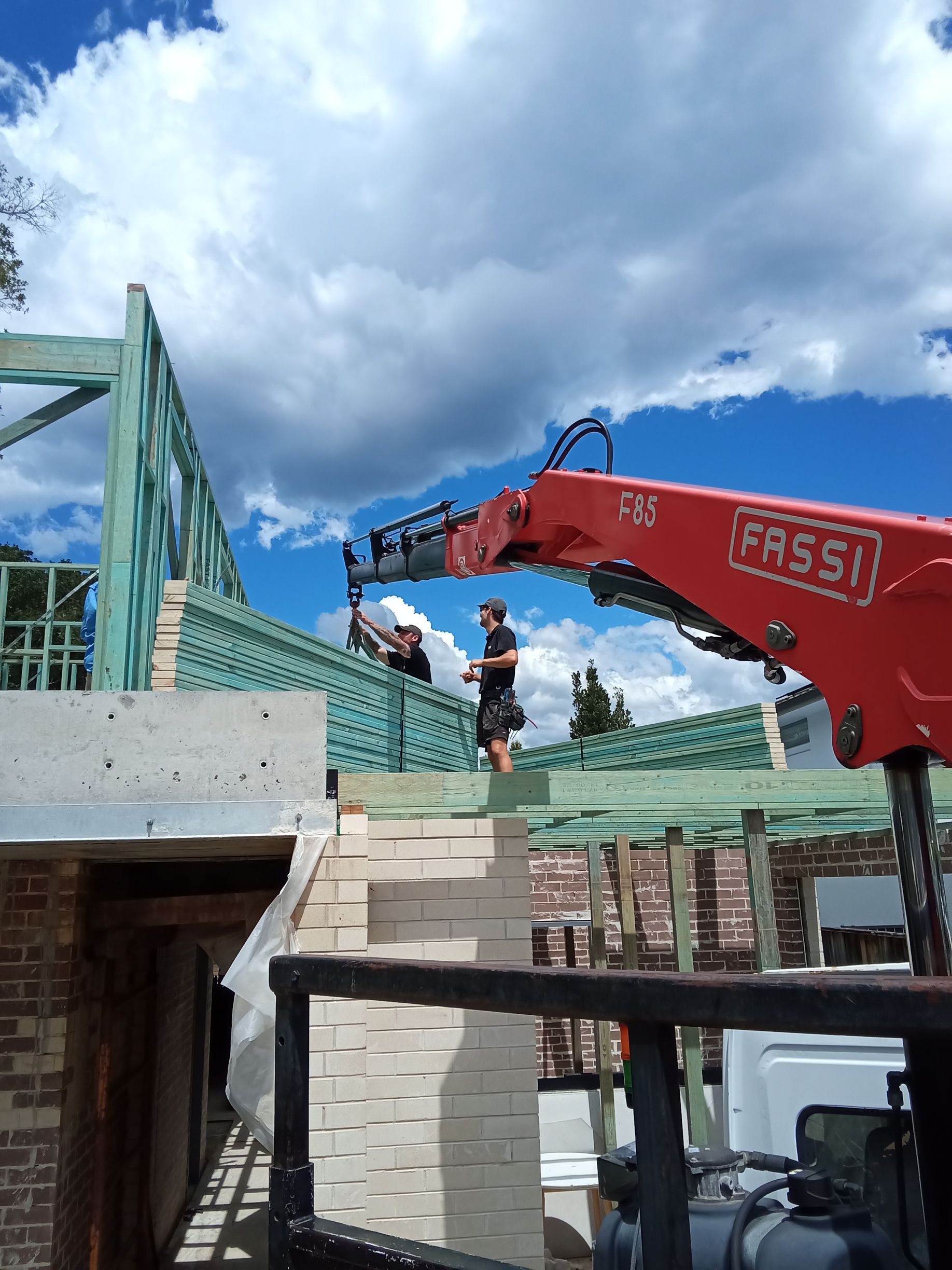 Gymea Bay Crane Delivering Roof Trusses on site to builders