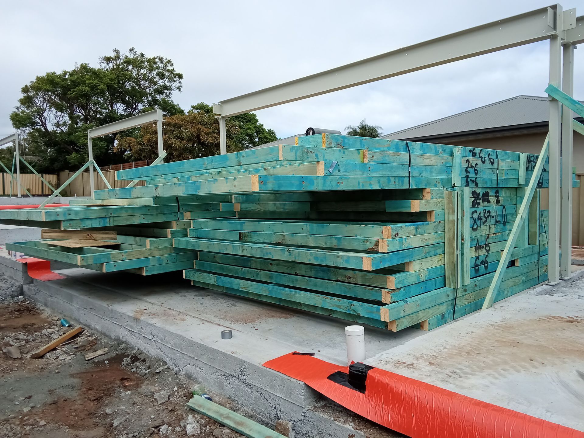 Prefabricated timber wall frames delivered to a residential building site in Oak Flats, Shellharbour.