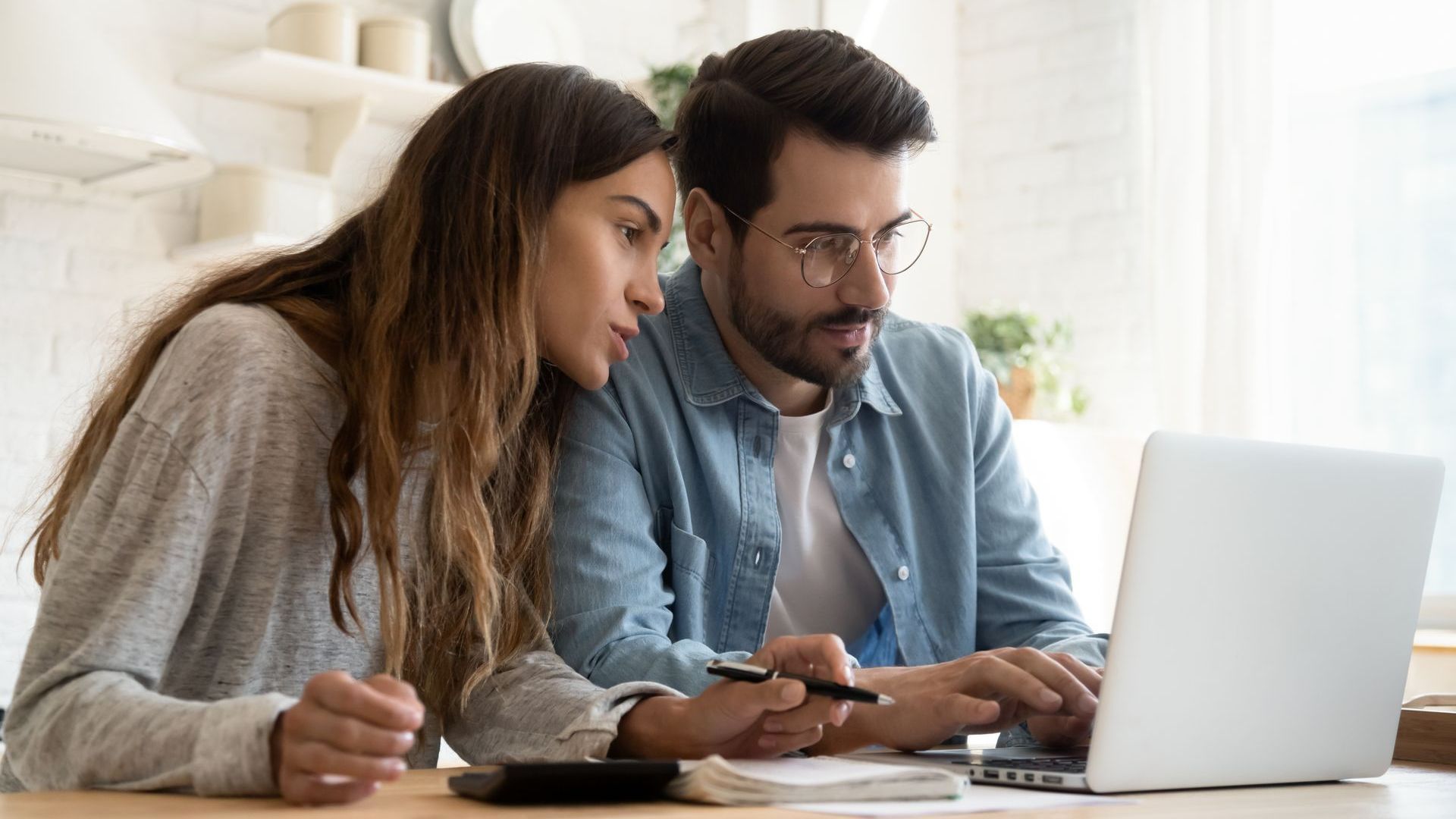 couple paying rent online
