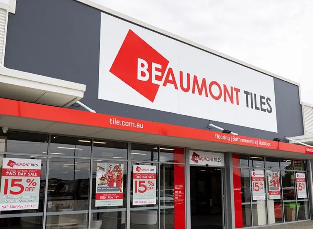 Beaumont Tiles store exterior with red and white signage, offering a 15% discount.