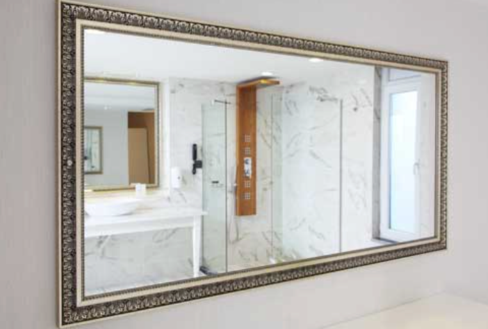 A room with a lot of mirrors on the wall