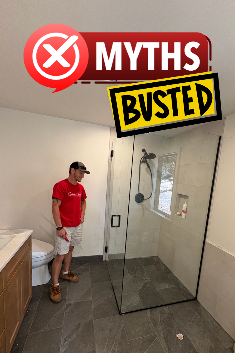 Man in red shirt in a bathroom.